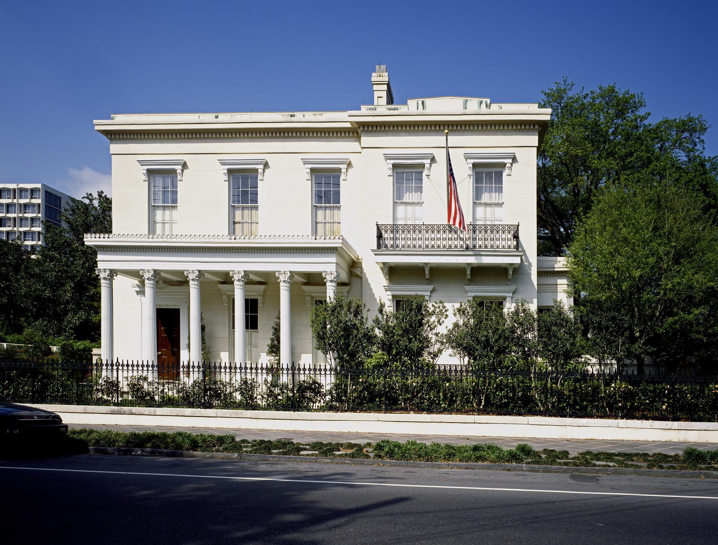 Greek Revival family home shaded by mature trees, New Orleans Garden District